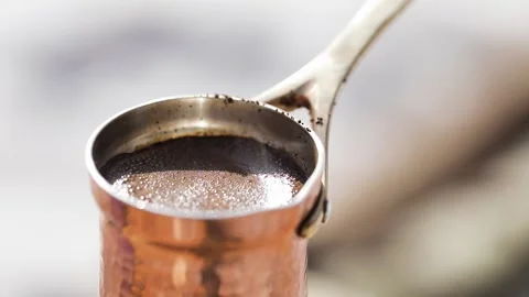 Copper Cezve for coffee in winter mountains Stock Footage 171127733