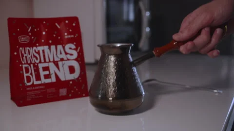 Copper cezve removed from table in natural daylight Stock Footage 327352081