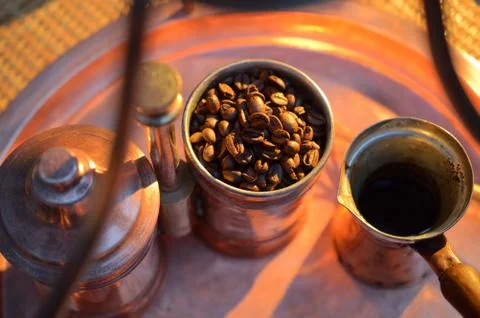 Copper coffee making facilities at sunset Stock Photos