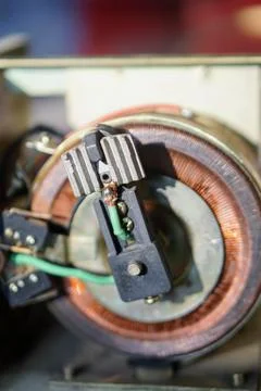 Copper coil component inside an automatic voltage regulator or servo stabilizer Stock Photos