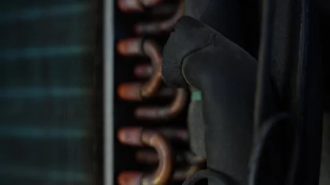 Copper cooling pipes and black insulation inside an air conditioner or refr.. 動画素材 338319436