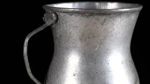 A copper cup with handle on black background Video stock 277972357