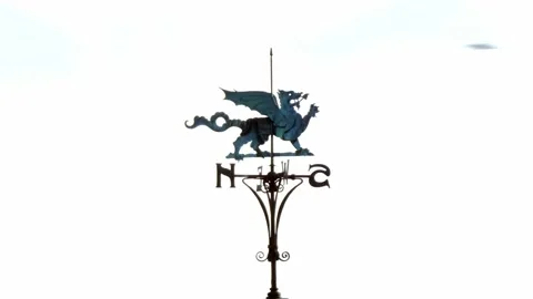 Copper dragon rusted weather vane rooftop compass pointer wind direction Stock Footage 168663802