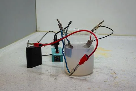Copper electrode in a solution containing silver nitrate Stock Photos