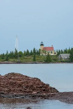 Copper Harbor Lighthouse viewed from across the water Stock Photos