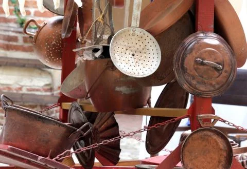 Copper objects for kitchen and home for sale at flea market Stock Photos