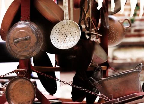 Copper objects for kitchen and home for sale at flea market Stock Photos