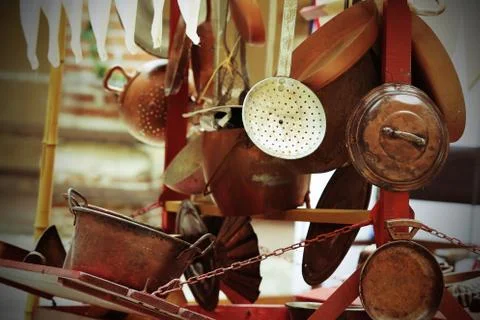 Copper objects for kitchen and home for sale at flea market Stock Photos