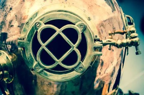 Copper old diving helmet, close-up Stock Photos