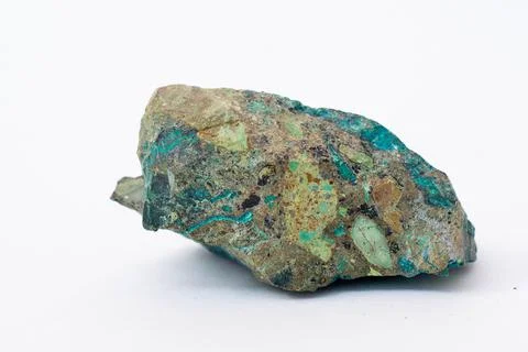 Copper ore from a copper mine in Chile, a green stone on a white background. Foto stock