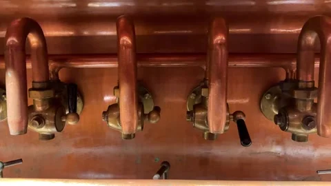 Copper pipes and valves system in a brewery Video stock 318680305
