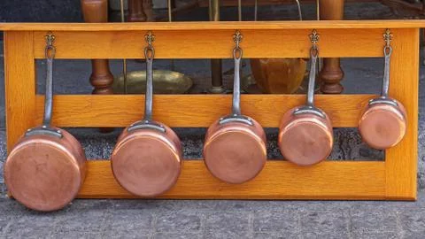 Copper pots shelf Stock Photos