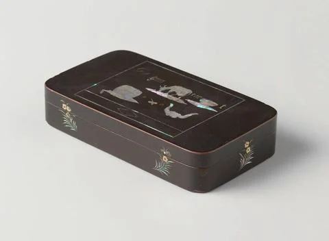 . Copper rectangular box with rounded corners, painted black. Flower branc... Stock Photos