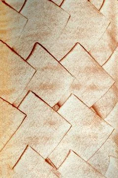Copper rhomb on a white wall Stock Photos