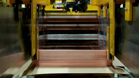 Copper sheets are fed to the package after processing Stock Footage 103847588