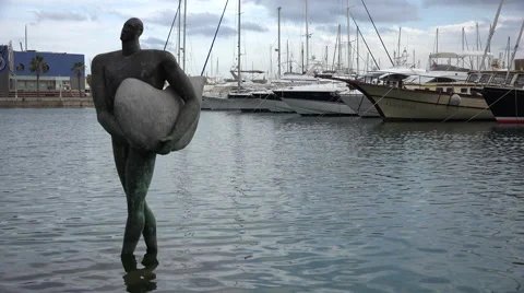 Copper statue - Icarus Returns, Alicante marina Stock Footage 44344996