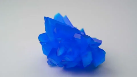 Copper sulphate crystal on white background Video stock 87251428