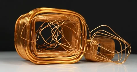 Copper windings different sizes from electric current transformers Stock Footage 323330003