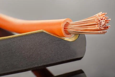 Copper Wire Cable Close Up on Cutting Blade Stock Photos