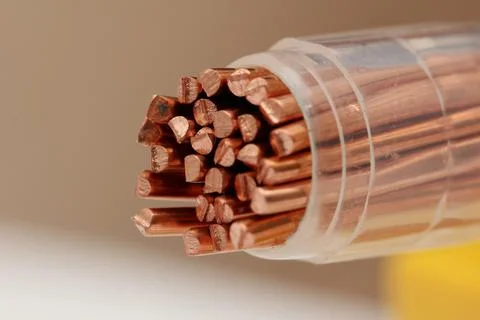 Copper wire in a dense insulating braid Stock Photos