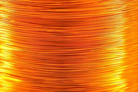Copper wire for electronics close-up with a focus on the center and blurred Stock Photos