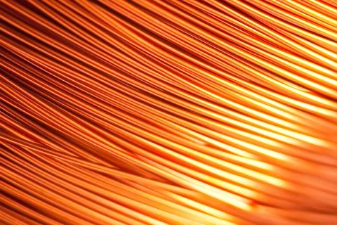 Copper wire for electronics close-up with a focus on the center and blurred Stock Photos