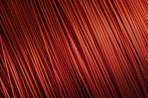 Copper wire for electronics close-up with a focus on the center and blurred Stock Photos