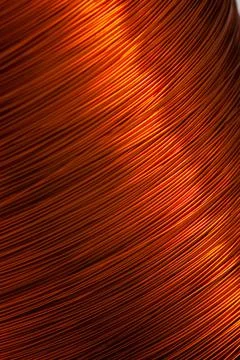 Copper wire for electronics close-up with a focus on the center and blurred Foto stock