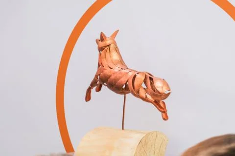 Copper wire sculpture of a wolf made from electrical cable. Industrial art piece Stock Photos