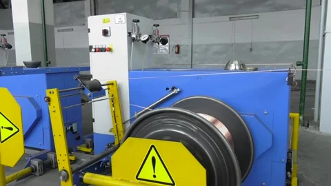 Copper wire is strung like a string. Productions of flexible multicore cable. Stock Footage 100406207