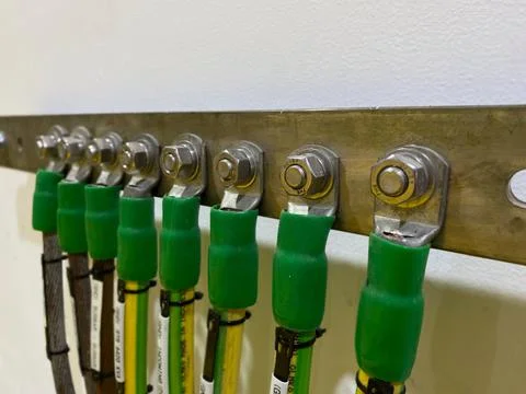 Copper wire in wall for grounding system Stock Photos