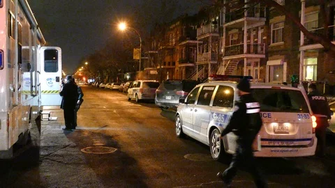 Cops entering large command center vehicle in Montreal, Quebec, Canada Stock Footage 100180085