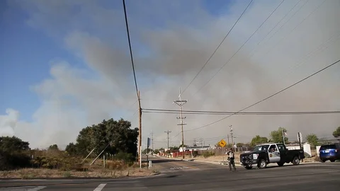 Cops at road block for fire Stock Footage 114415373