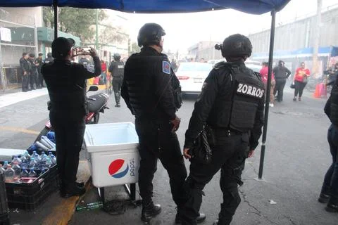 Cops stand guard on a strike Stock Photos