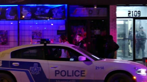Cops walking with handcuffed black man Stock Footage 138619978