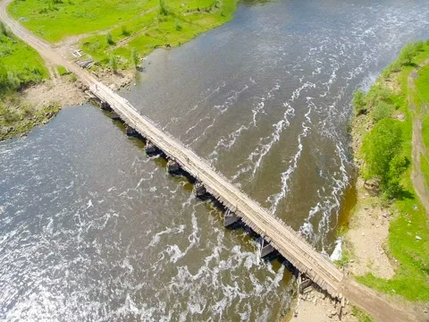 Copter aerial view over bridge and river 스톡 동영상 77491123
