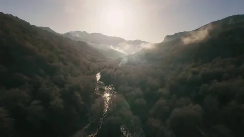 The Copter Flies Over the Gorge at the Bottom Flows the River in Front of Stock Footage 69177910