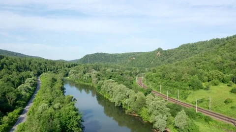A copter flies over a river valley. Stock Footage 119067800