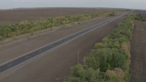 Copter flies over the road Stock Footage 151252845