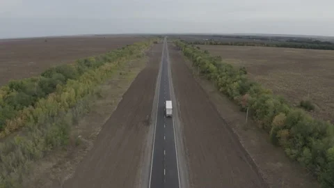 Copter flies over the road Stock Footage 151252846