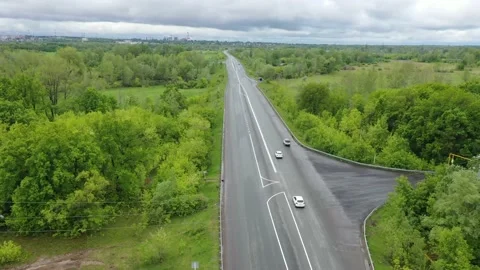 Copter flies over the road Stock Footage 151252874