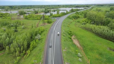 Copter flies over the road Stock Footage 151252887