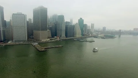 Copter flight above Hudson river near Brooklyn bridge Stock Footage 80858899