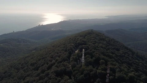 Copter flight over the green forest and mountains. Sochi Akhun Mountain. Aerial Vidéo 99460790