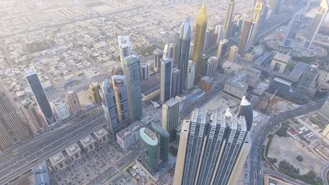 Copter fly beside with roads and skyscrapers of Dubai Stock Footage 75447070
