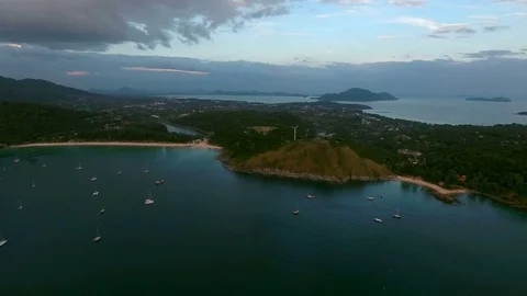 Copter fly over the yachts moored in a bay near old fishing village in Phuket 動画素材 73515291