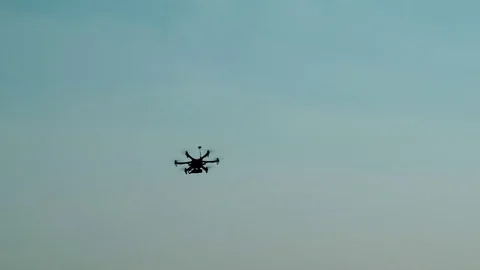 Copter flying into blue sky Stock Footage 81142701