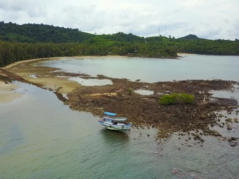 Copter Flying Over boat on a stone aground and Tropical Ko Kut Island Stock Footage