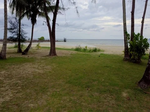 Copter Flying Over boat on a stone aground Ko Kut Island Palm trees Stock Footage 75987216