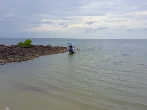 Copter Flying Over boat stranded Ko Kut Island overcast Buddha Stock Footage 75989706